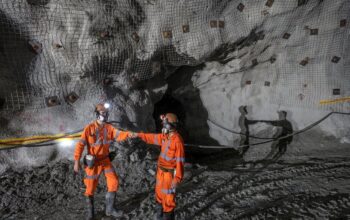 Resultados de produção de ouro da AngloGold Ashanti em 2024, destacando a produção de 2,66 milhões de onças globalmente e a atuação no Brasil e Argentina.