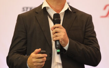 Apresentação da Tega sobre revestimento híbrido em moinhos de grande porte no Workshop Opex 2025